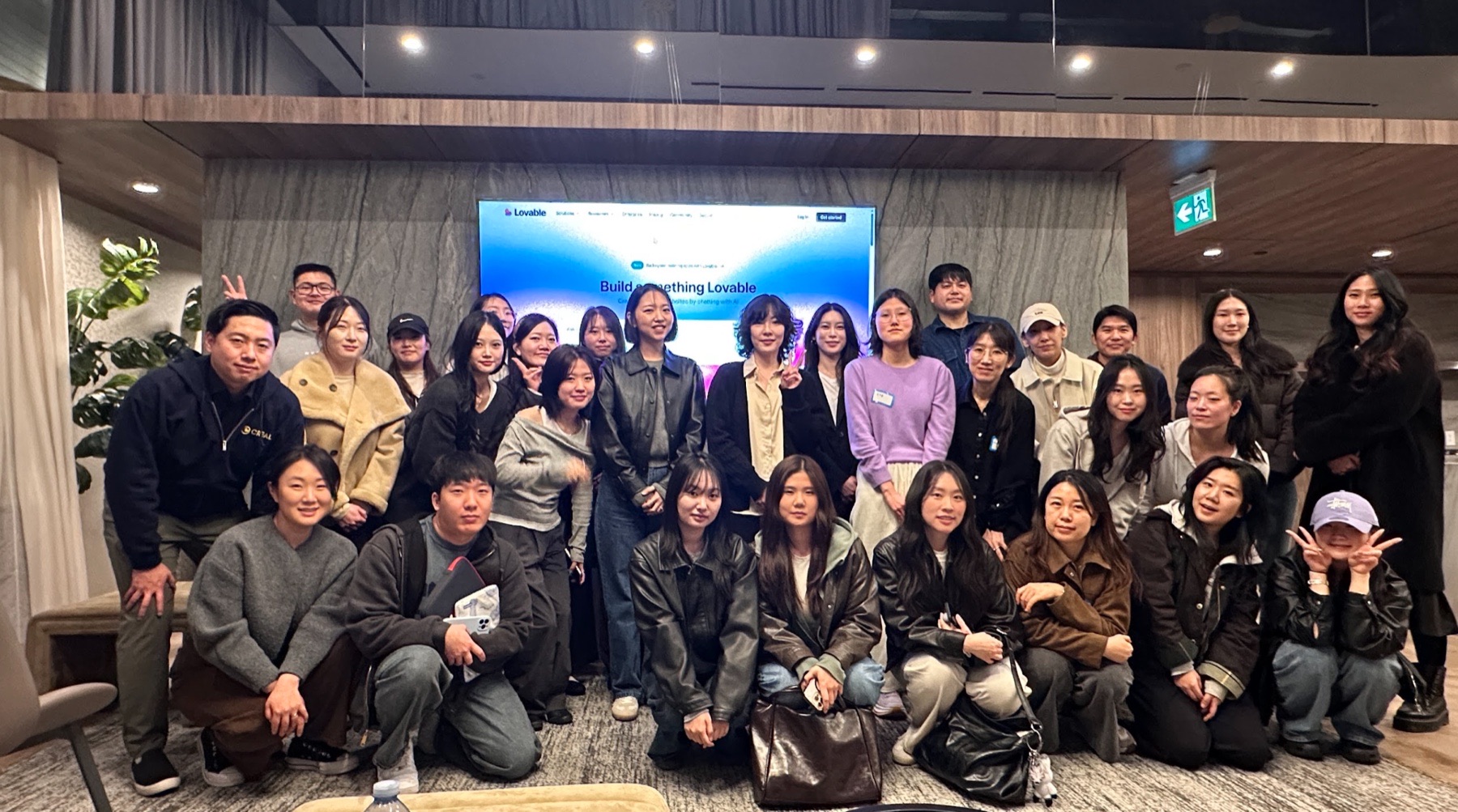 Participants, speakers, and hosts gathered after the AI and Design Lovable mini hackathon