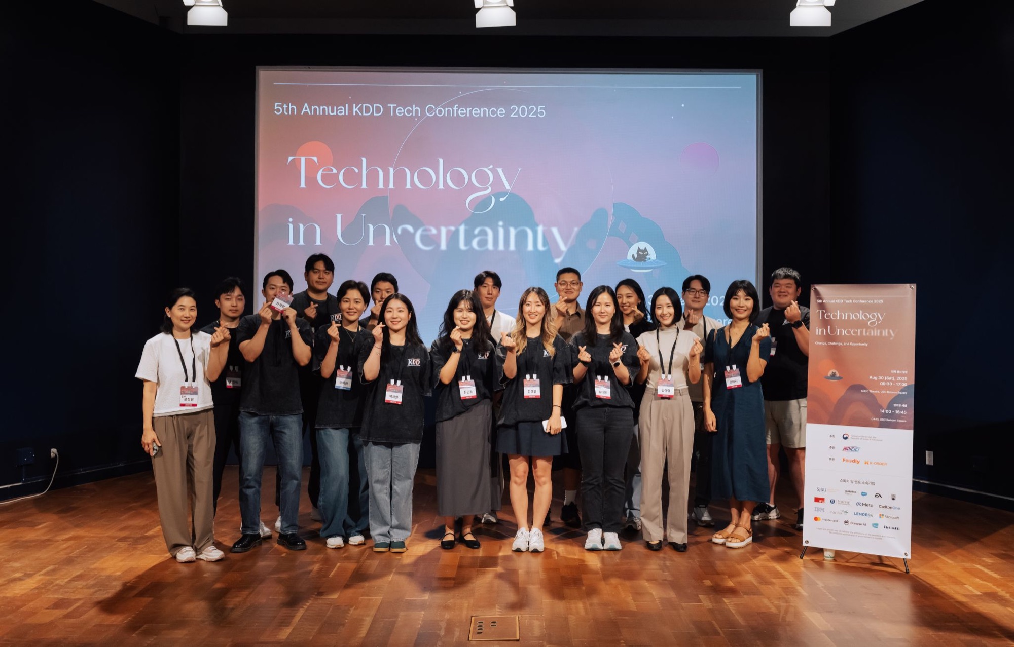 The Vancouver KDD team and contributors on stage after the conference