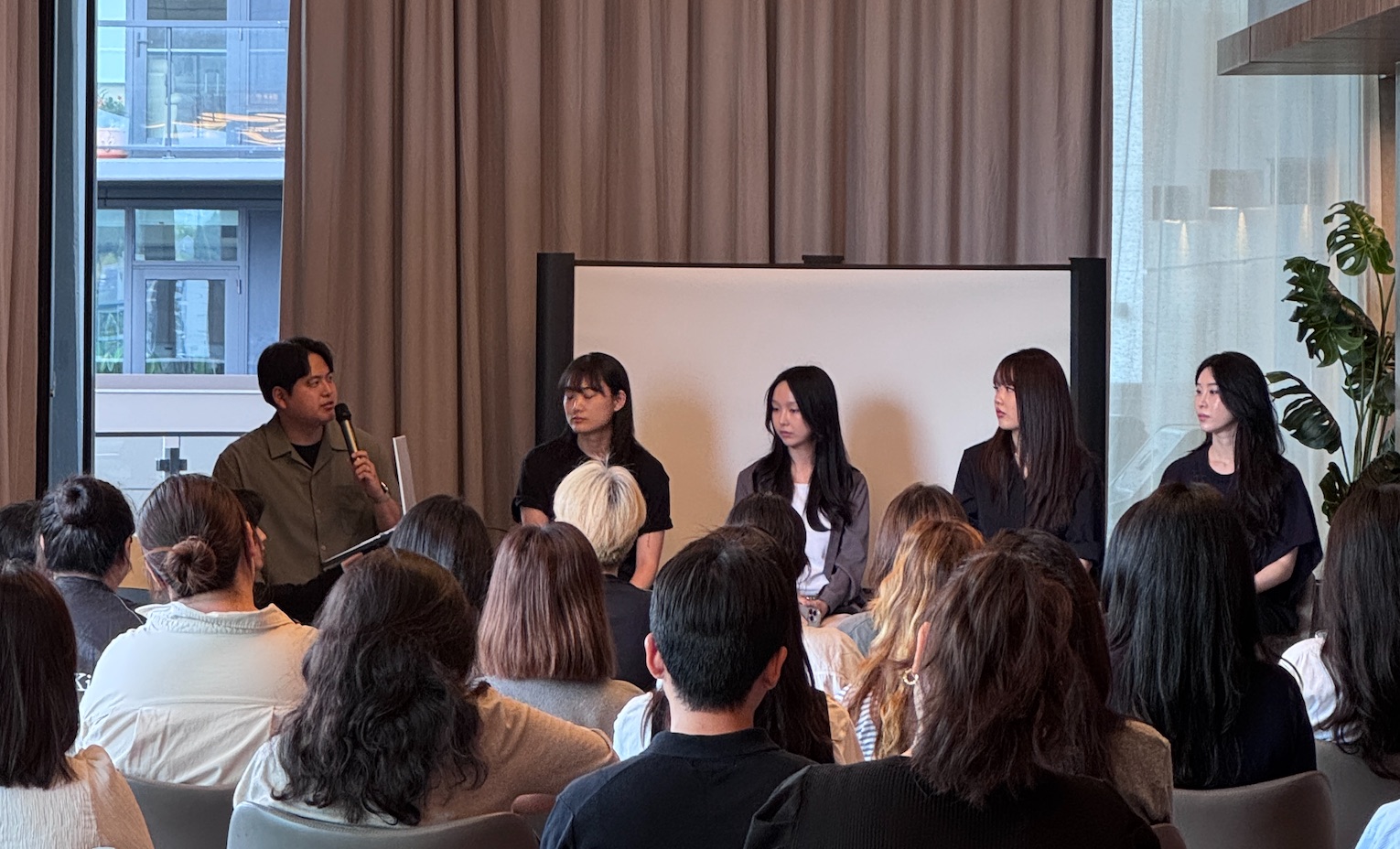Erik Park speaking alongside four other speakers at the KDNEW-sponsored career fireside chat in Burnaby